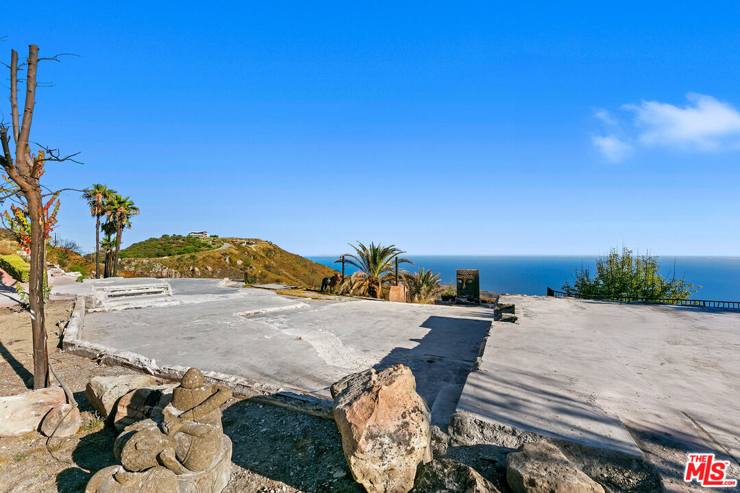 23000 Saddle Peak Road Topanga, CA 90290 - Photo 22 of 26 a view of a patio with furniture