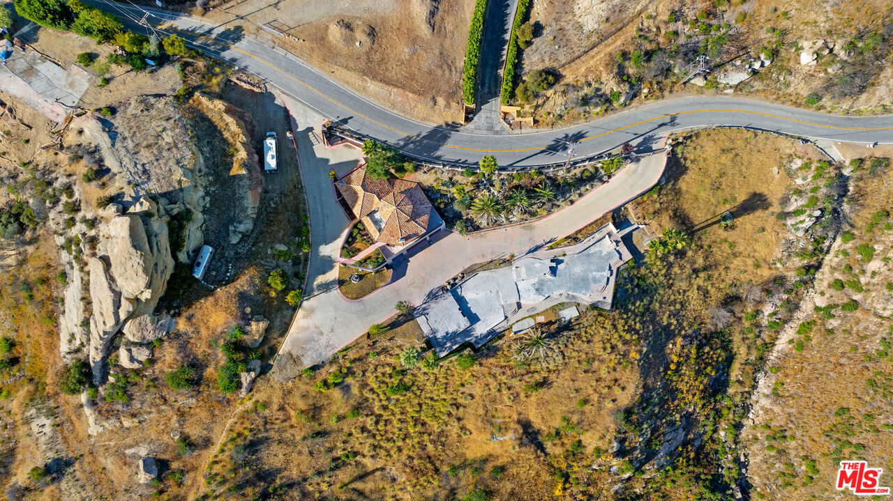 23000 Saddle Peak Road Topanga, CA 90290 - Photo 25 of 26 a view of swimming pool with a yard