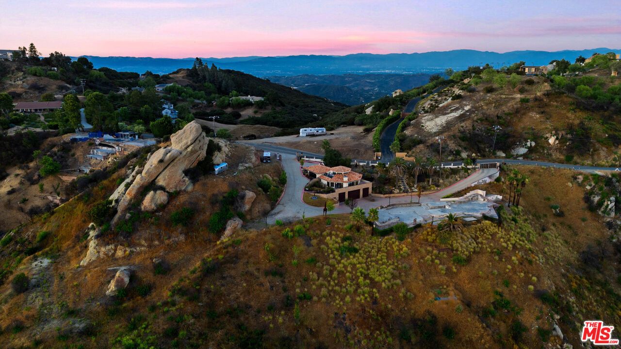 23000 Saddle Peak Road Topanga, CA 90290 - Photo 4 of 26 a view of a town with mountains in the background