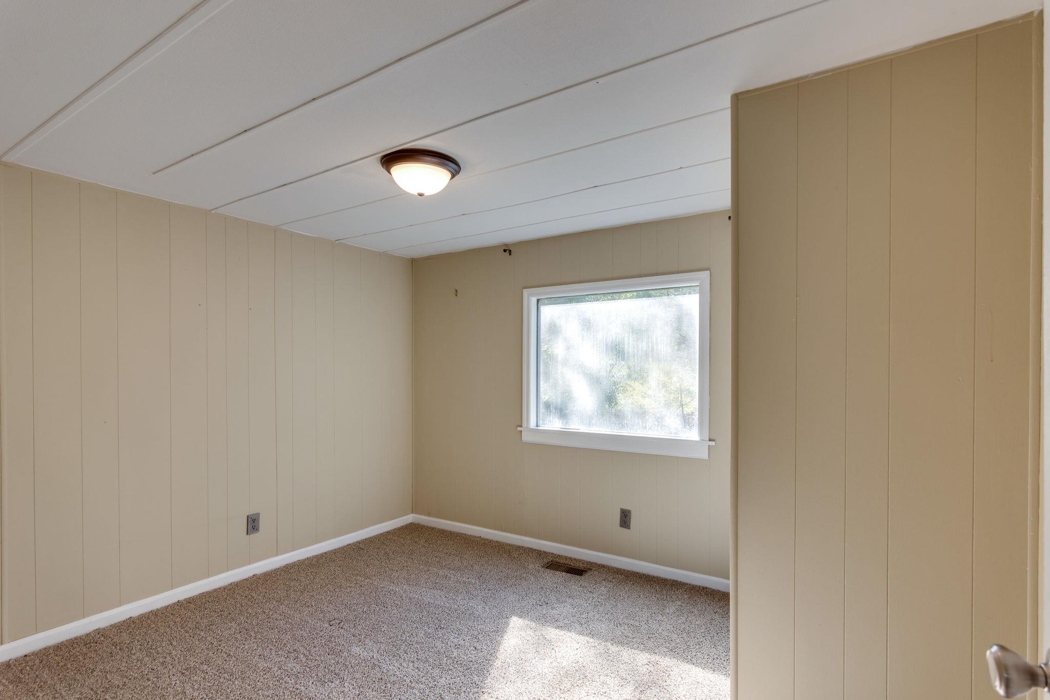 5029 Will Brown Road Spring Hill, TN 37174 - Photo 16 of 24 an empty room with a window
