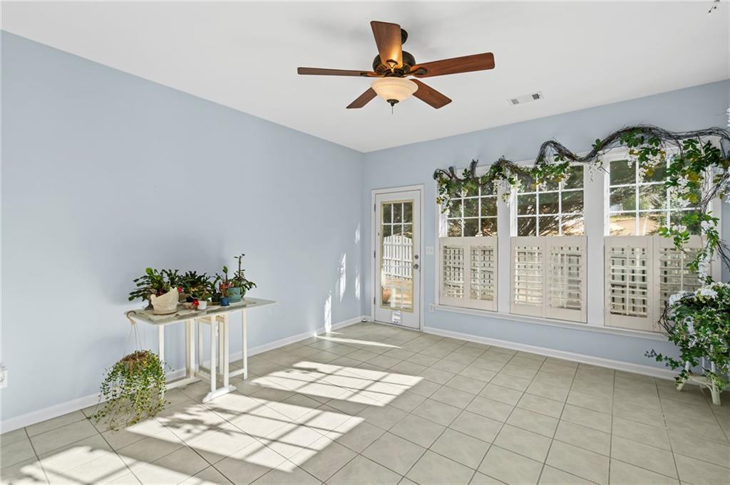4945 Kings Common Way Cumming, GA 30040 - Photo 18 of 40 a view of an entryway with wooden floor