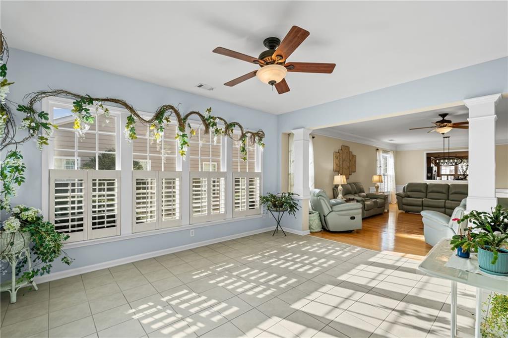 4945 Kings Common Way Cumming, GA 30040 - Photo 19 of 40 a view of a livingroom with furniture
