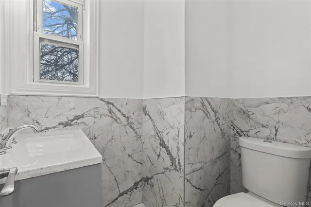 a bathroom with a sink and a toilet