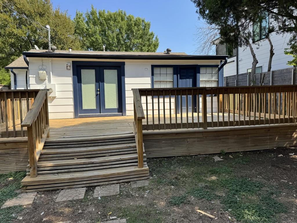 8427 Ridgelea Street Dallas, TX 75209 - Photo 4 of 17 a view of a house with a yard and wooden floor