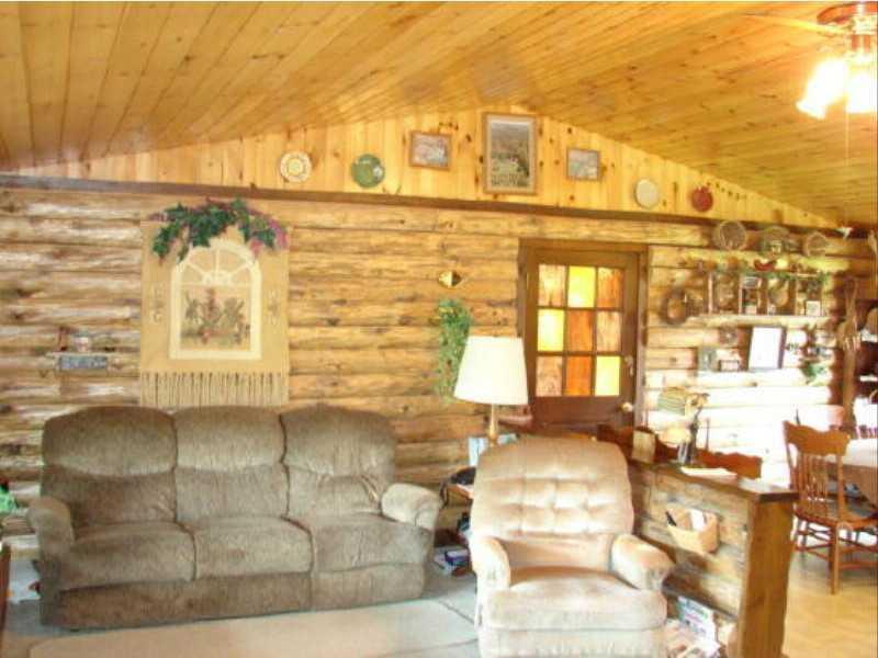 1388 South Solon Road Solon, ME 04979 - Photo 4 of 21 Living Room. log home living room