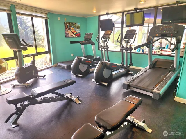 a view of a room with gym equipment