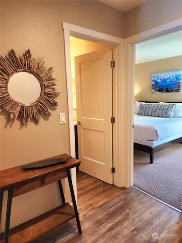 a view of a livingroom with furniture and front door