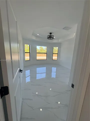 a view of an entryway with front door