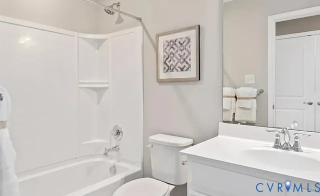 a view of a house with a yard and plants