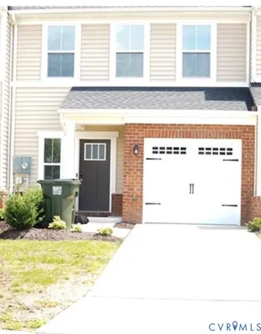 a view of a living room and kitchen
