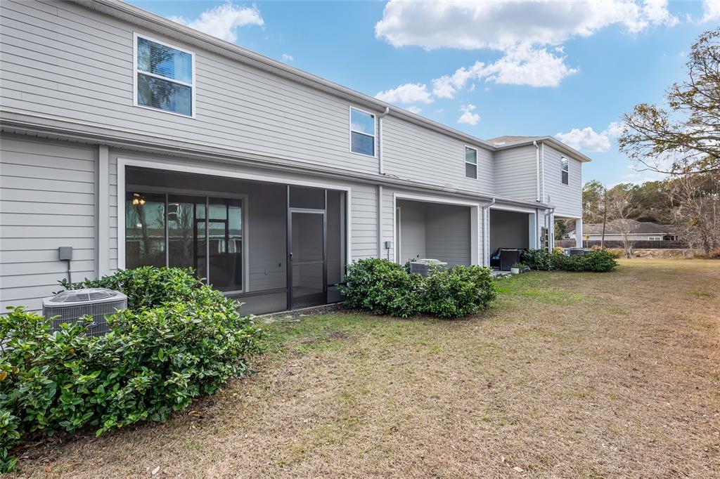 13818 Northwest 9th Road Newberry, FL 32669 - Photo 17 of 56 a view of a house with a garden