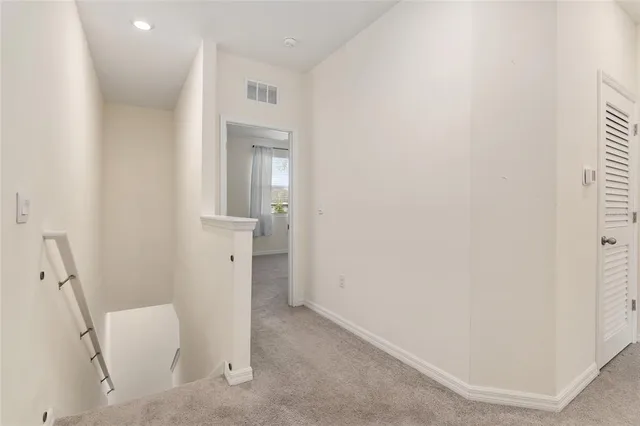 a view of small space with racks on the wall