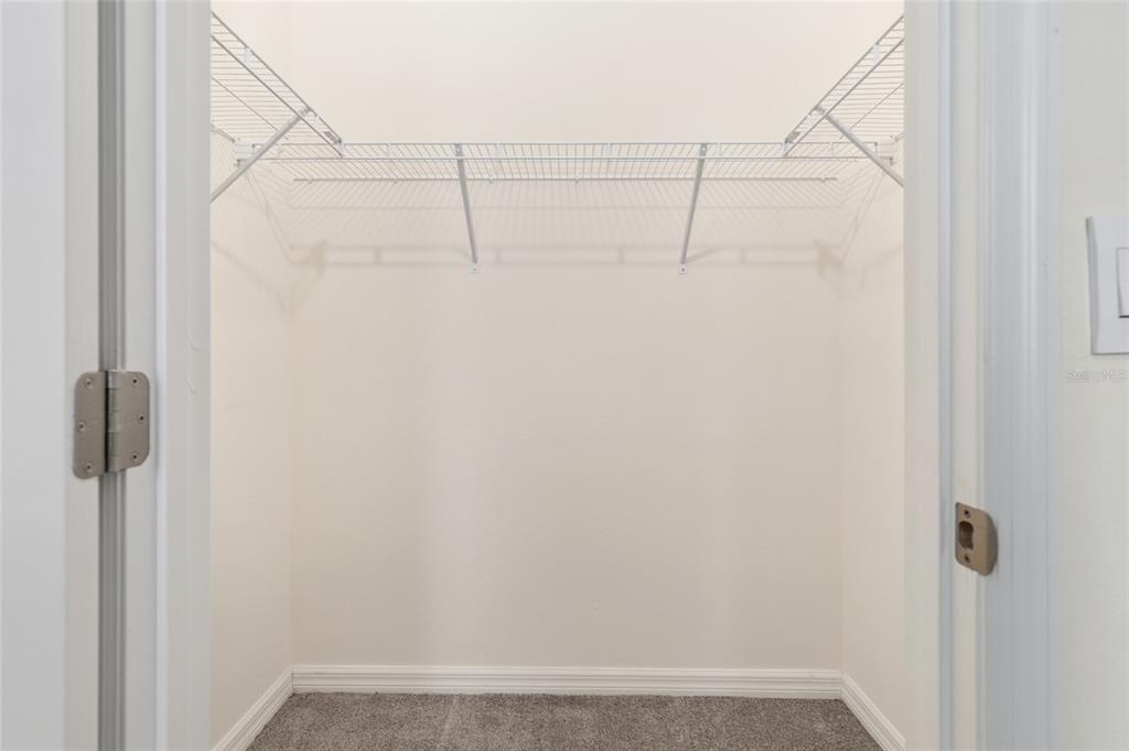 13818 Northwest 9th Road Newberry, FL 32669 - Photo 22 of 56 a view of small space with racks on the wall