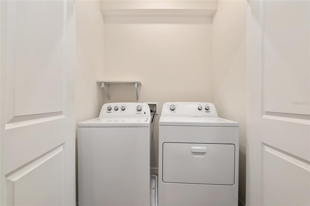 13818 Northwest 9th Road Newberry, FL 32669 - Photo 24 of 56 a utility room with dryer and washer