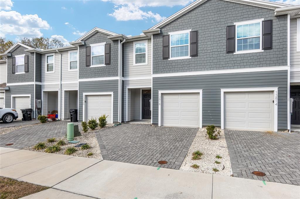 13818 Northwest 9th Road Newberry, FL 32669 - Photo 28 of 56 a front view of a house with entertaining space
