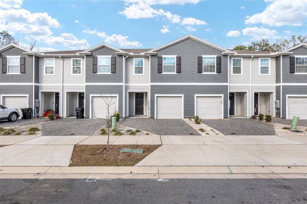 13818 Northwest 9th Road Newberry, FL 32669 - Photo 30 of 56 a front view of multiple houses