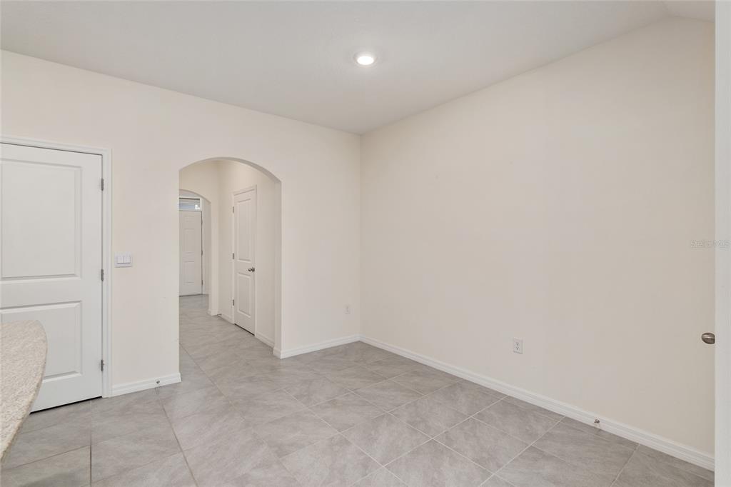 13818 Northwest 9th Road Newberry, FL 32669 - Photo 31 of 56 an empty room with a door