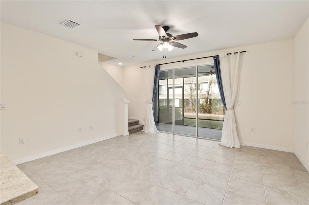 13818 Northwest 9th Road Newberry, FL 32669 - Photo 35 of 56 an empty room with windows and outdoor view