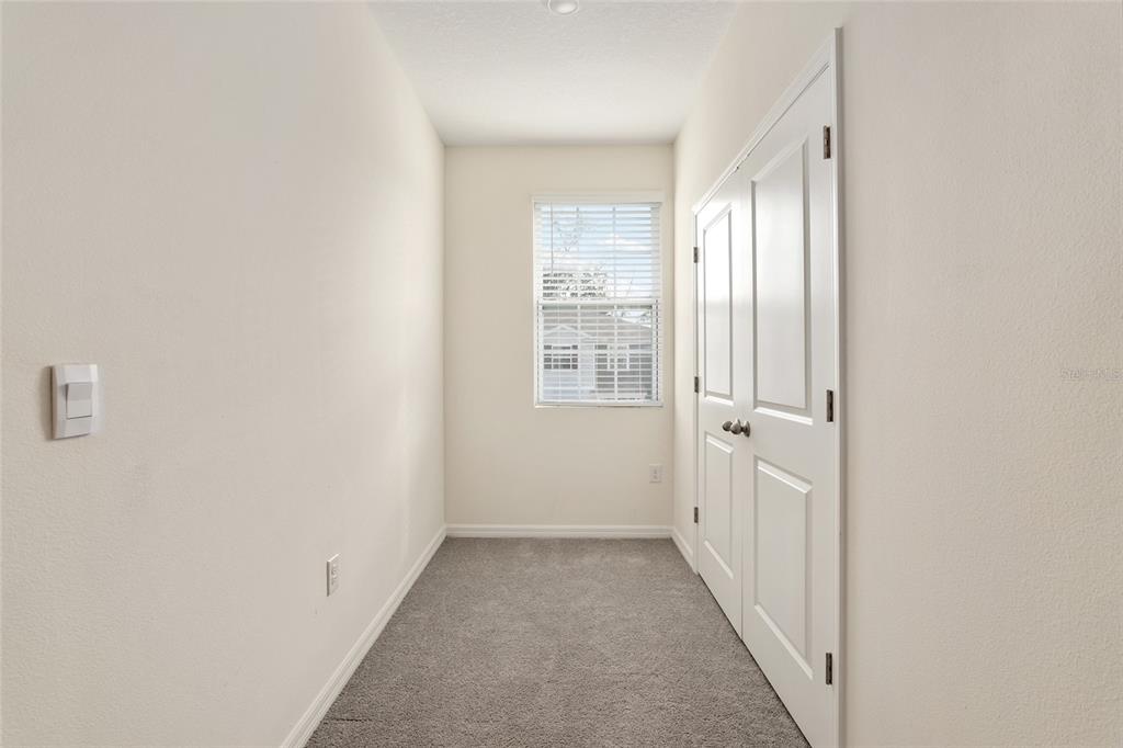 13818 Northwest 9th Road Newberry, FL 32669 - Photo 41 of 56 a view of a hallway with a window