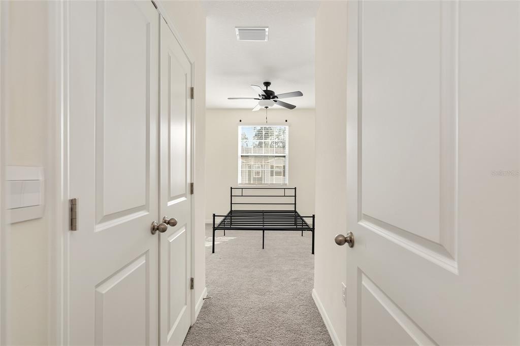 13818 Northwest 9th Road Newberry, FL 32669 - Photo 42 of 56 a view of a hallway view with wooden floor and staircase