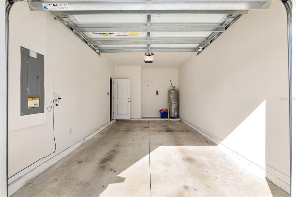 13818 Northwest 9th Road Newberry, FL 32669 - Photo 44 of 56 a view of a hallway with wooden floor and staircase