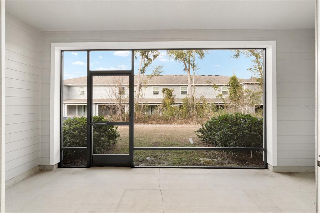 13818 Northwest 9th Road Newberry, FL 32669 - Photo 45 of 56 a view of outdoor space window and kitchen view