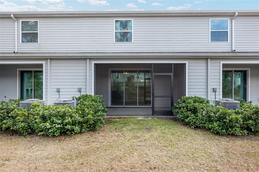 13818 Northwest 9th Road Newberry, FL 32669 - Photo 48 of 56 a front view of a house with garden