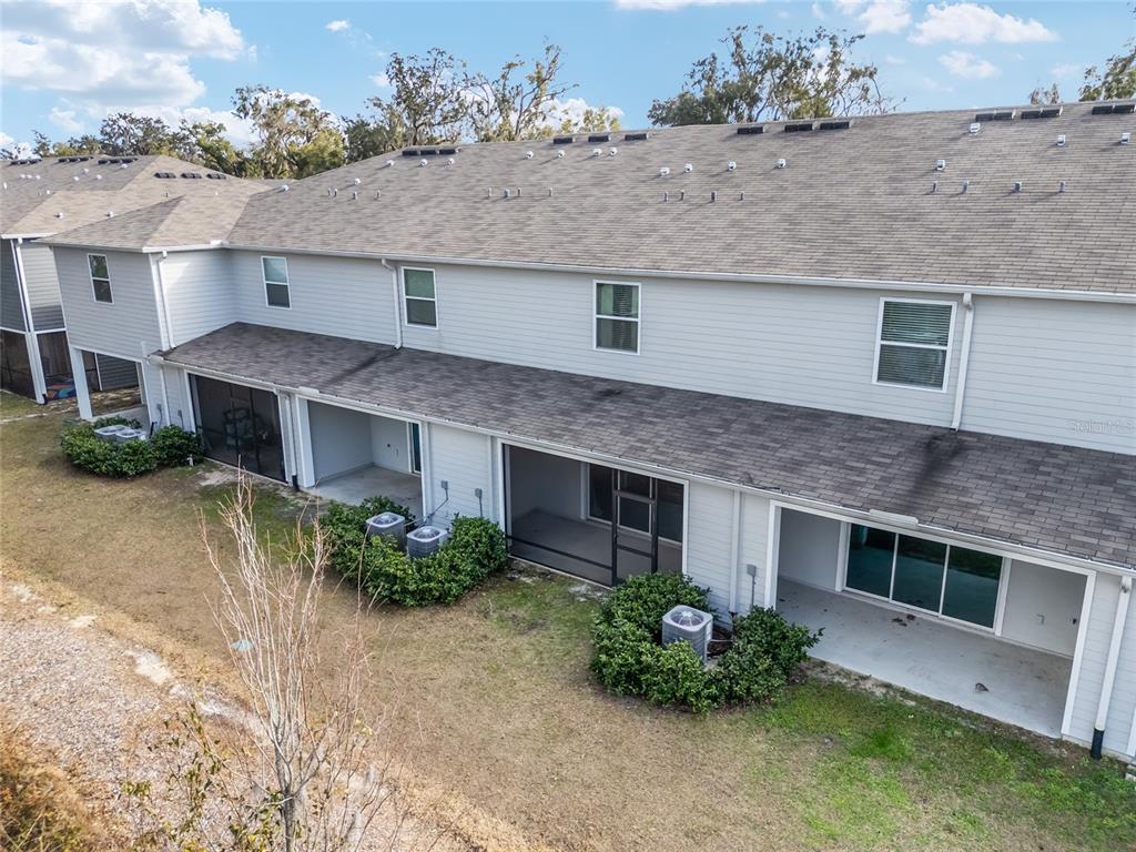 13818 Northwest 9th Road Newberry, FL 32669 - Photo 49 of 56 a front view of a house with a yard