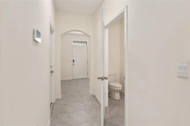 a kitchen with a sink cabinets and window