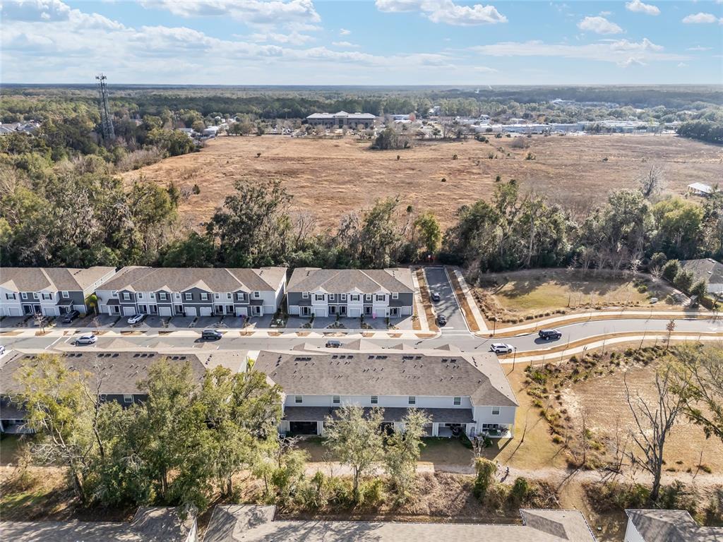 13818 Northwest 9th Road Newberry, FL 32669 - Photo 51 of 56 a view of a lake with a beach