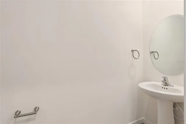 a kitchen with stainless steel appliances a microwave and refrigerator