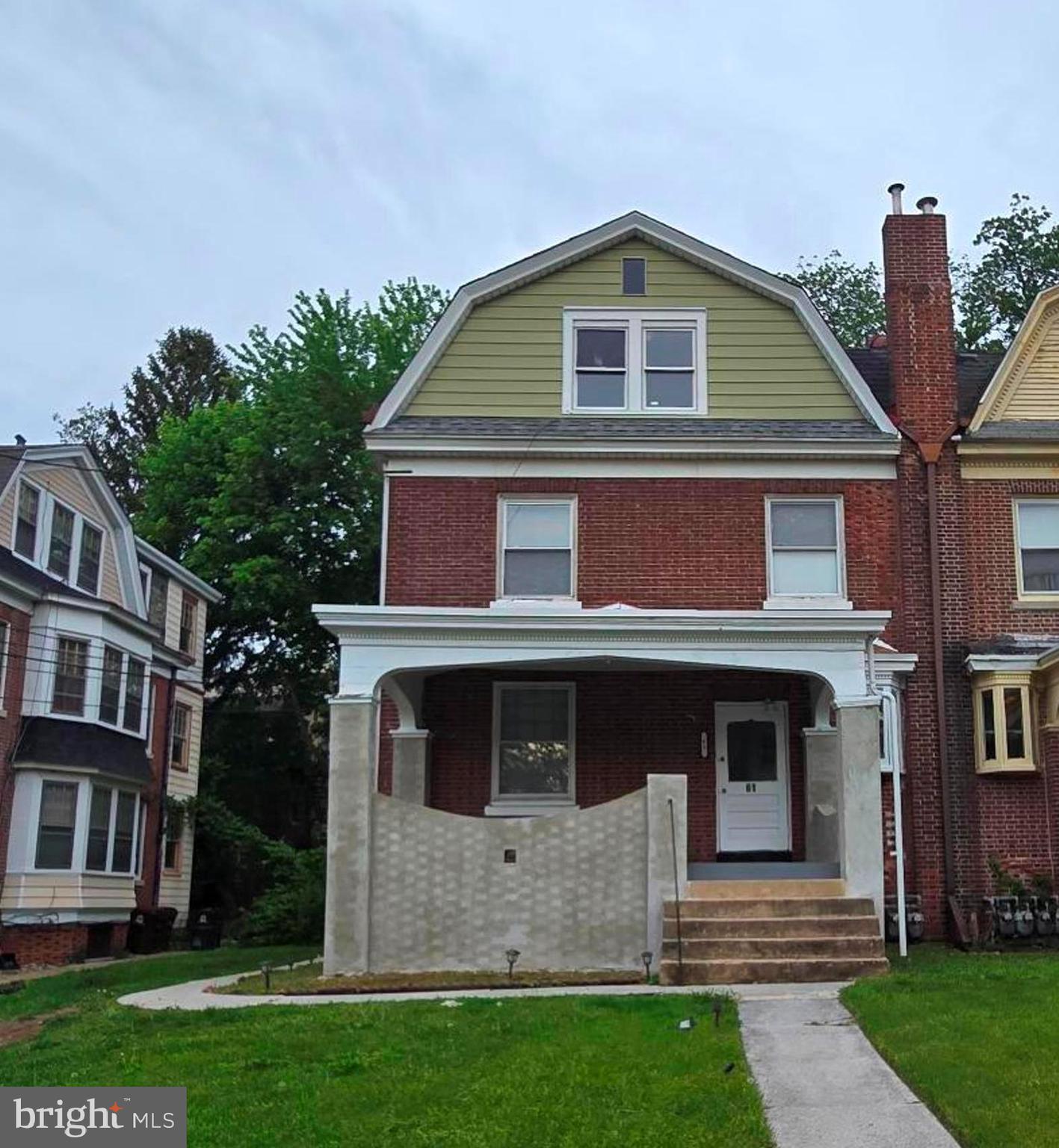 61 Owen Avenue Lansdowne, PA 19050 - Photo 1 of 19 a front view of a house with garden