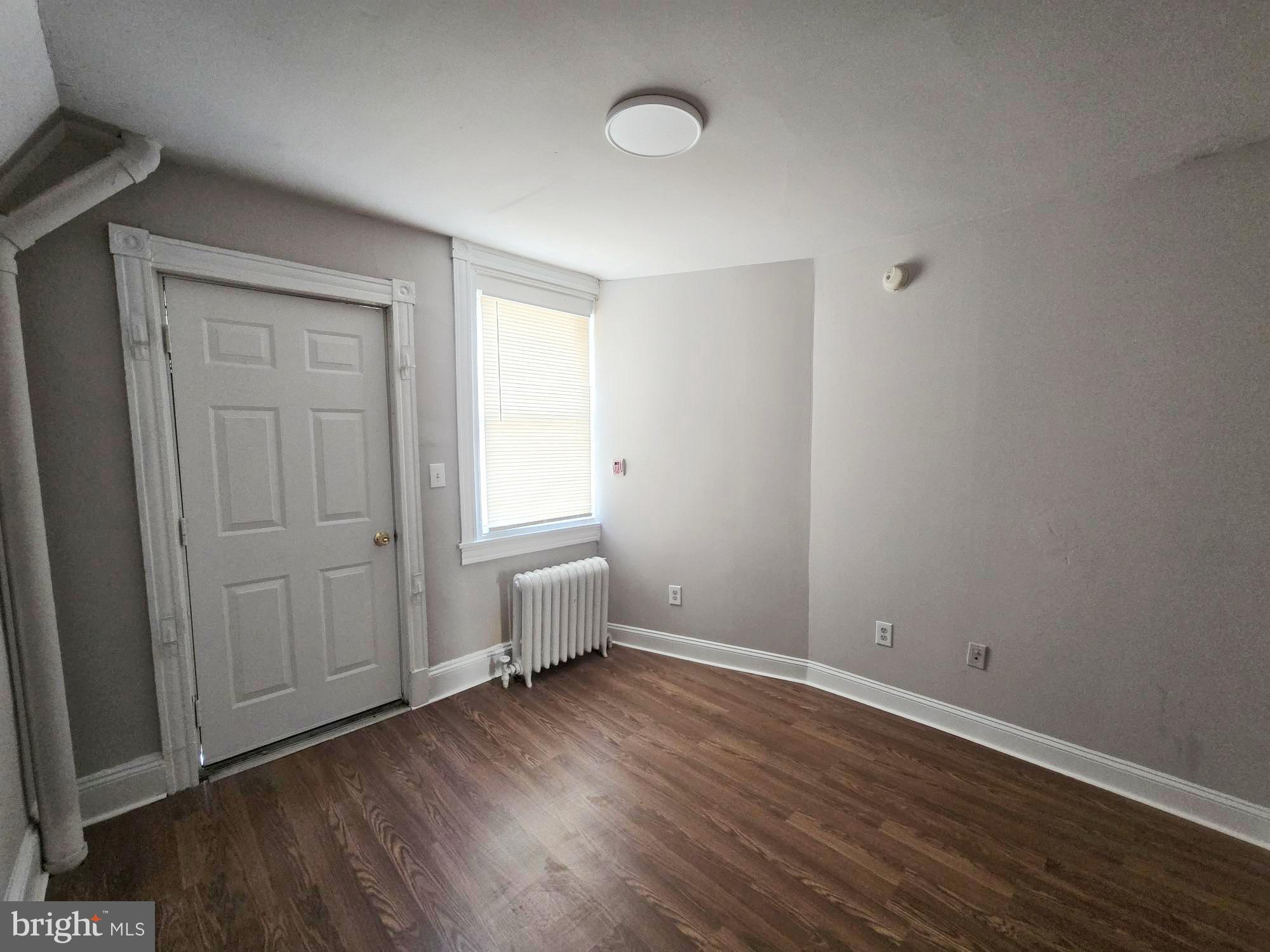 61 Owen Avenue Lansdowne, PA 19050 - Photo 15 of 19 a view of a room with wooden floor and window