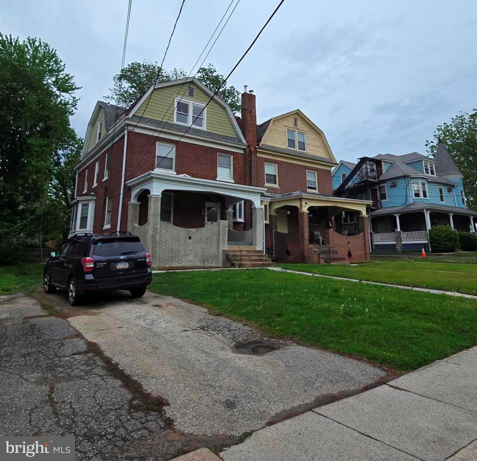 61 Owen Avenue Lansdowne, PA 19050 - Photo 18 of 19 a front view of a house with a yard