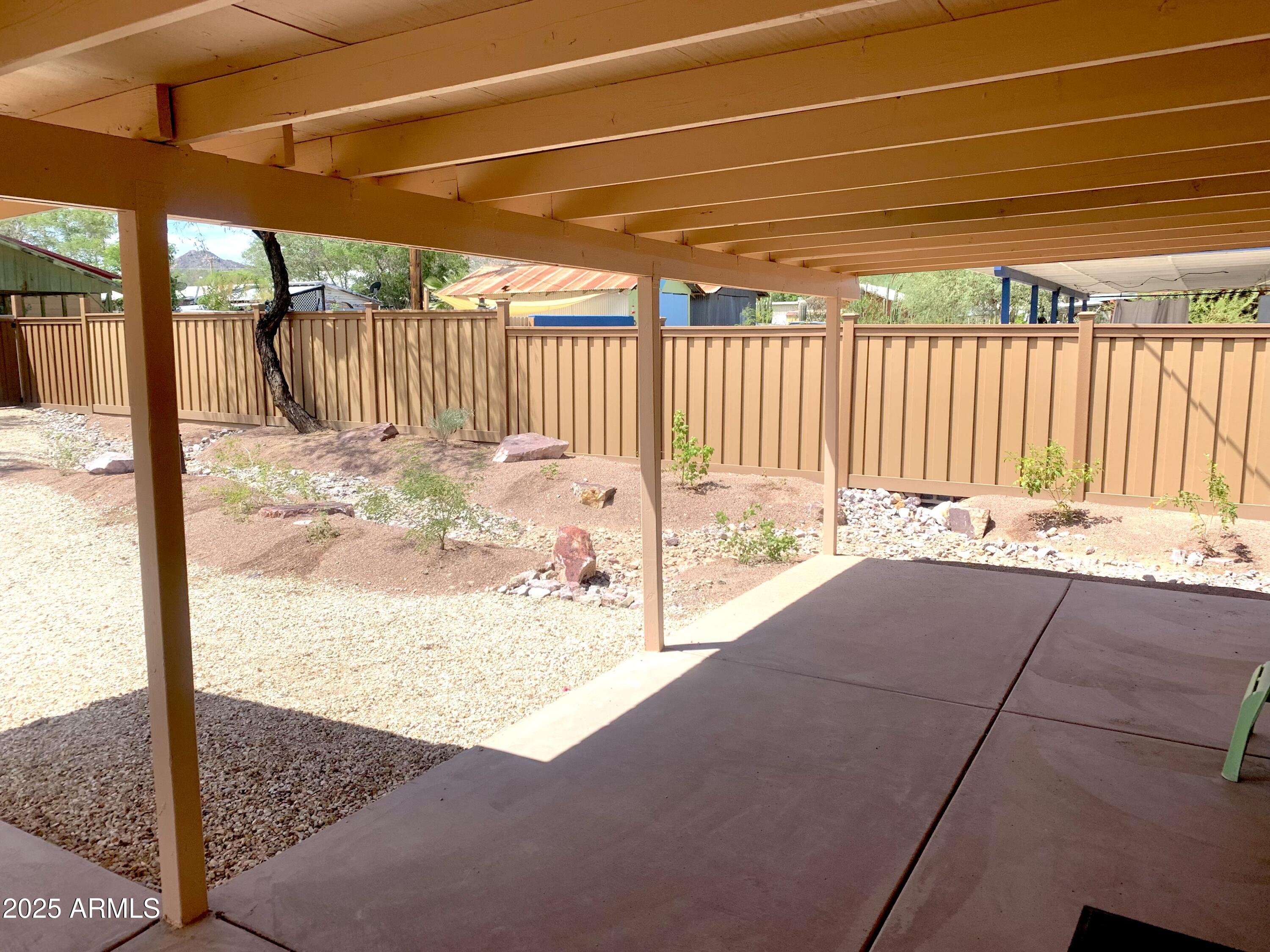 311 Solana Avenue Ajo, AZ 85321 - Photo 15 of 22 a view of a backyard of a house