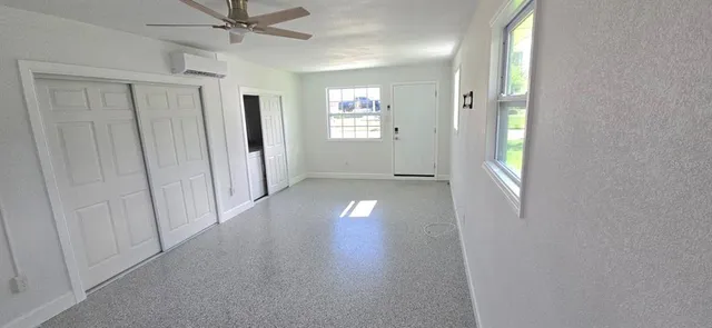 a view of empty room with a window