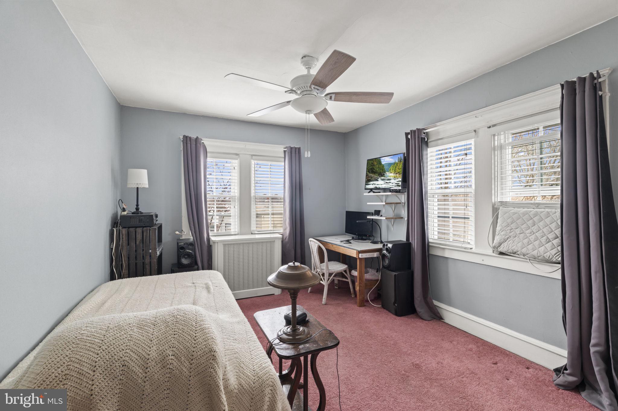330 Burmont Road Drexel Hill, PA 19026 - Photo 19 of 35 a bedroom with a bed and a window