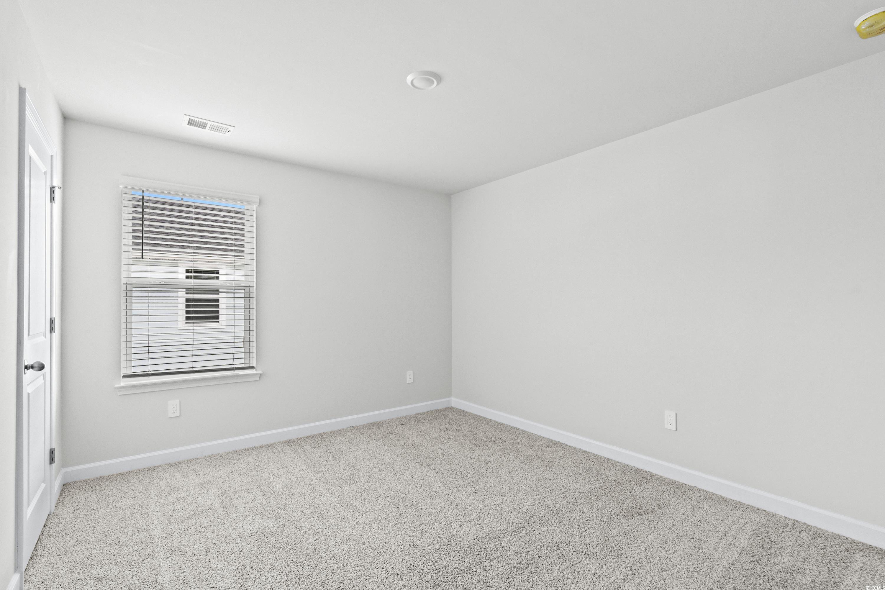 2113 Copper Crk Loop Longs, SC 29568 - Photo 24 of 37 Empty room featuring carpet flooring