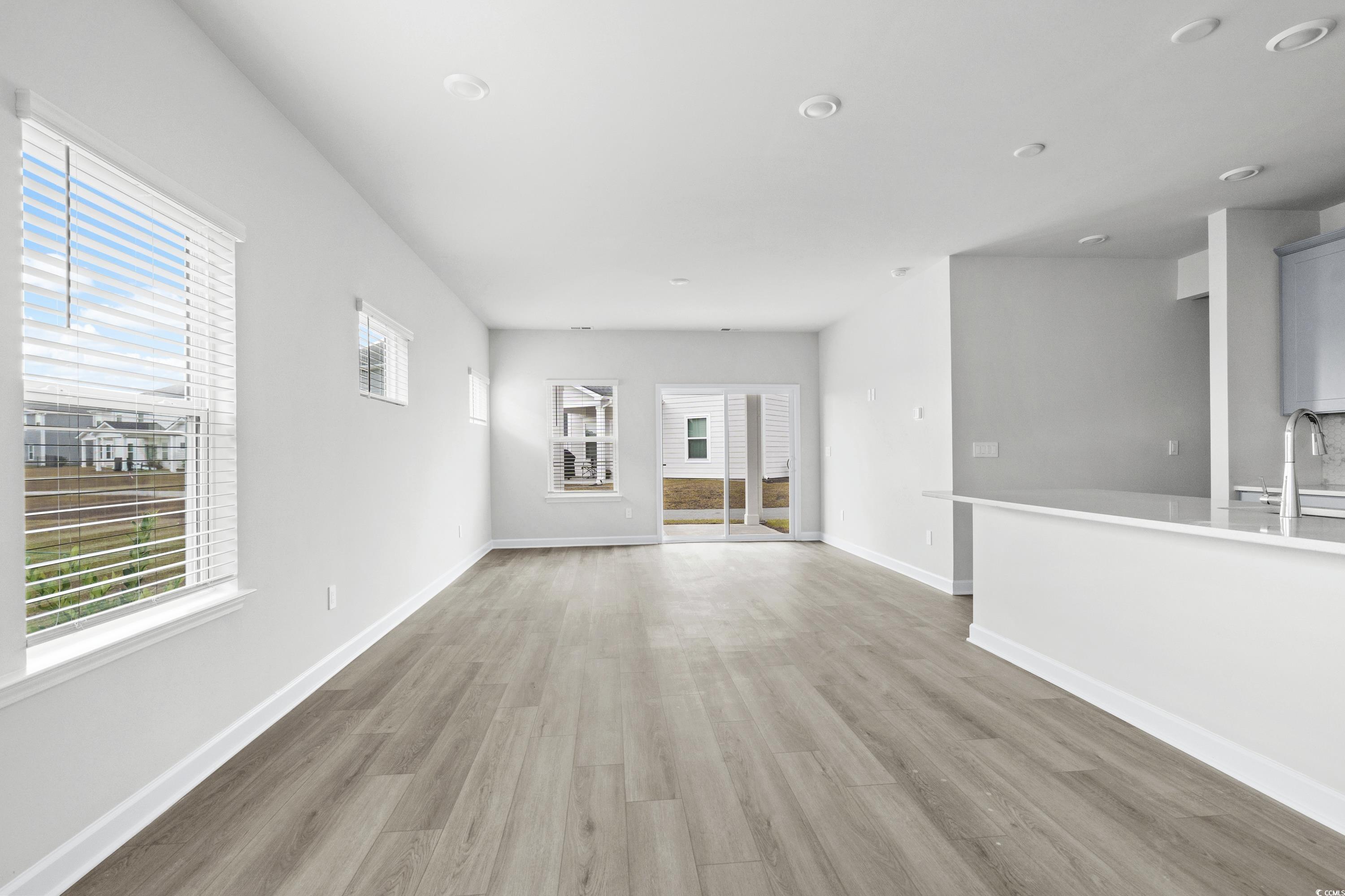 2113 Copper Crk Loop Longs, SC 29568 - Photo 4 of 37 Unfurnished living room featuring plenty of natura