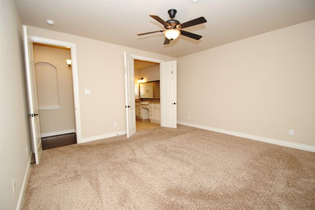 an empty room with a bathroom