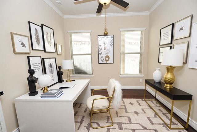 a living room with furniture and next to a window