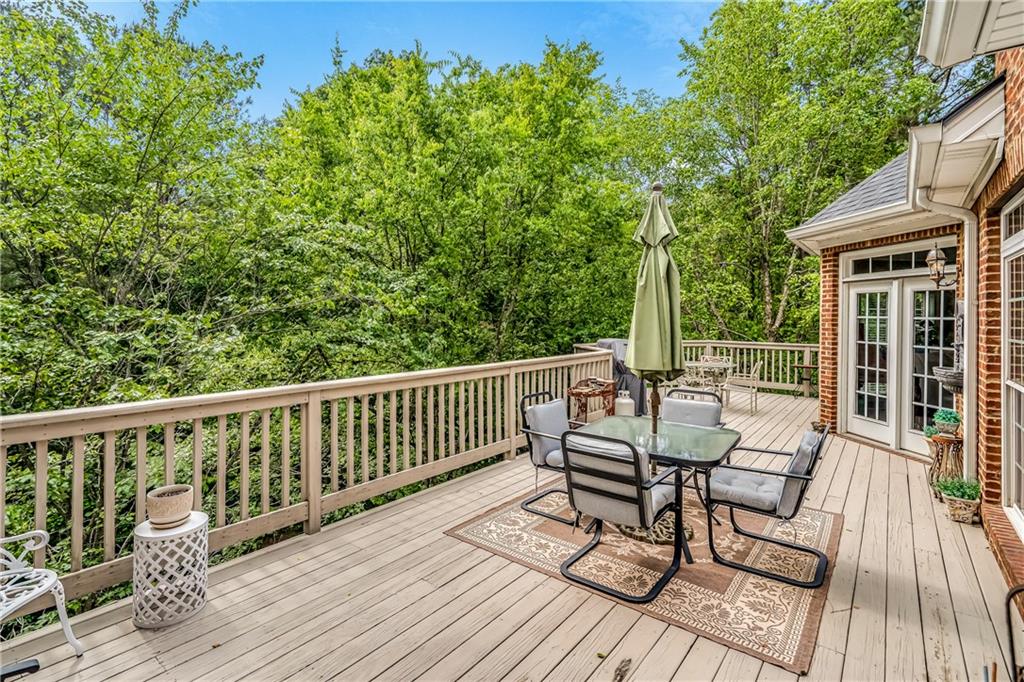 411 Overlook Way Cohutta, GA 30710 - Photo 23 of 86 a view of a deck with furniture and wooden floor
