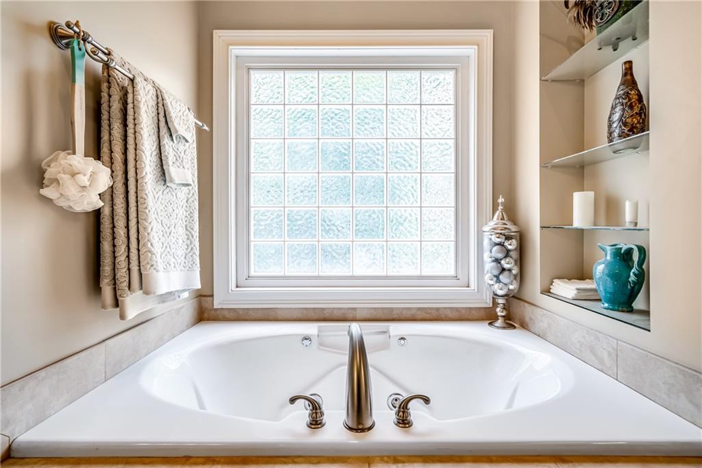 411 Overlook Way Cohutta, GA 30710 - Photo 51 of 86 a white bath tub sitting next to a window
