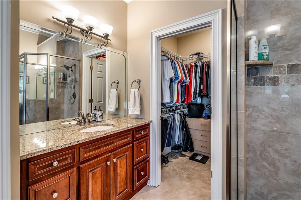 411 Overlook Way Cohutta, GA 30710 - Photo 53 of 86 a bathroom with a sink and a mirror