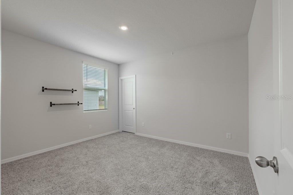 7041 Feather River Place Parrish, FL 34219 - Photo 21 of 32 a view of empty room