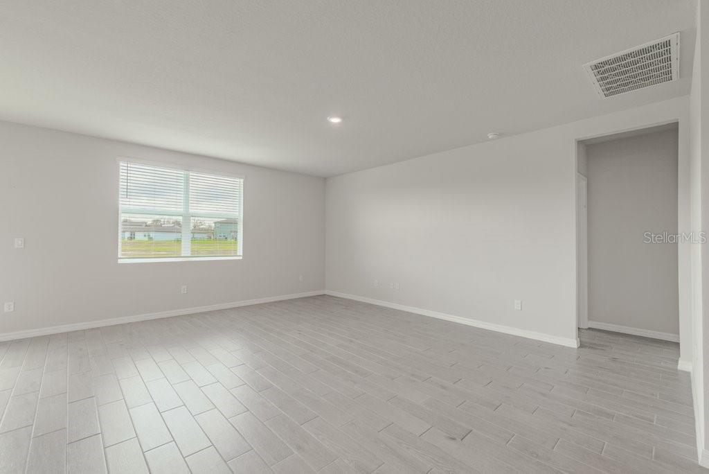 7041 Feather River Place Parrish, FL 34219 - Photo 7 of 32 an empty room with windows
