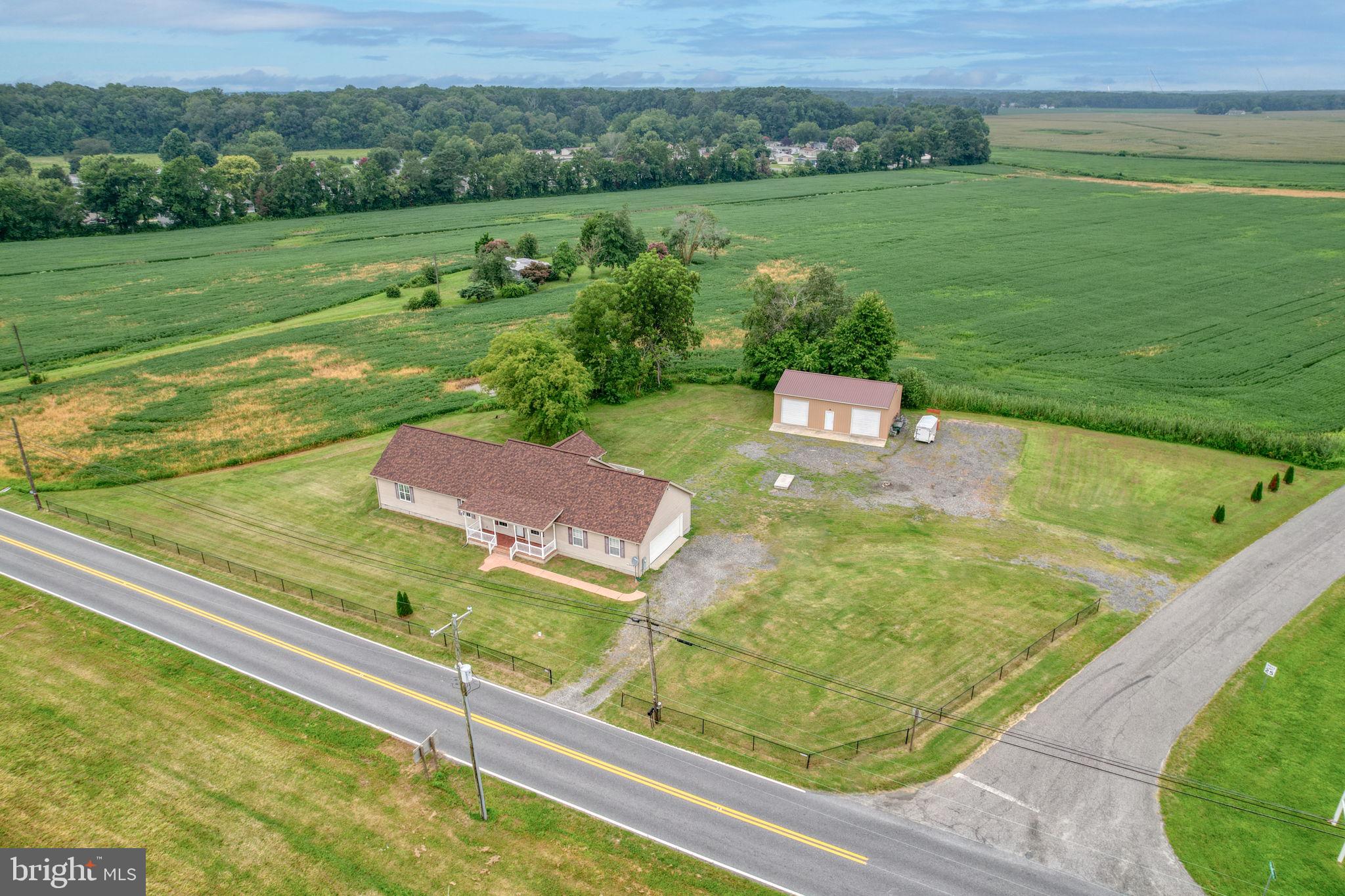 5926 Mt Holly Road East New Market, MD 21631 - Photo 2 of 36 a view of a pool with a yard