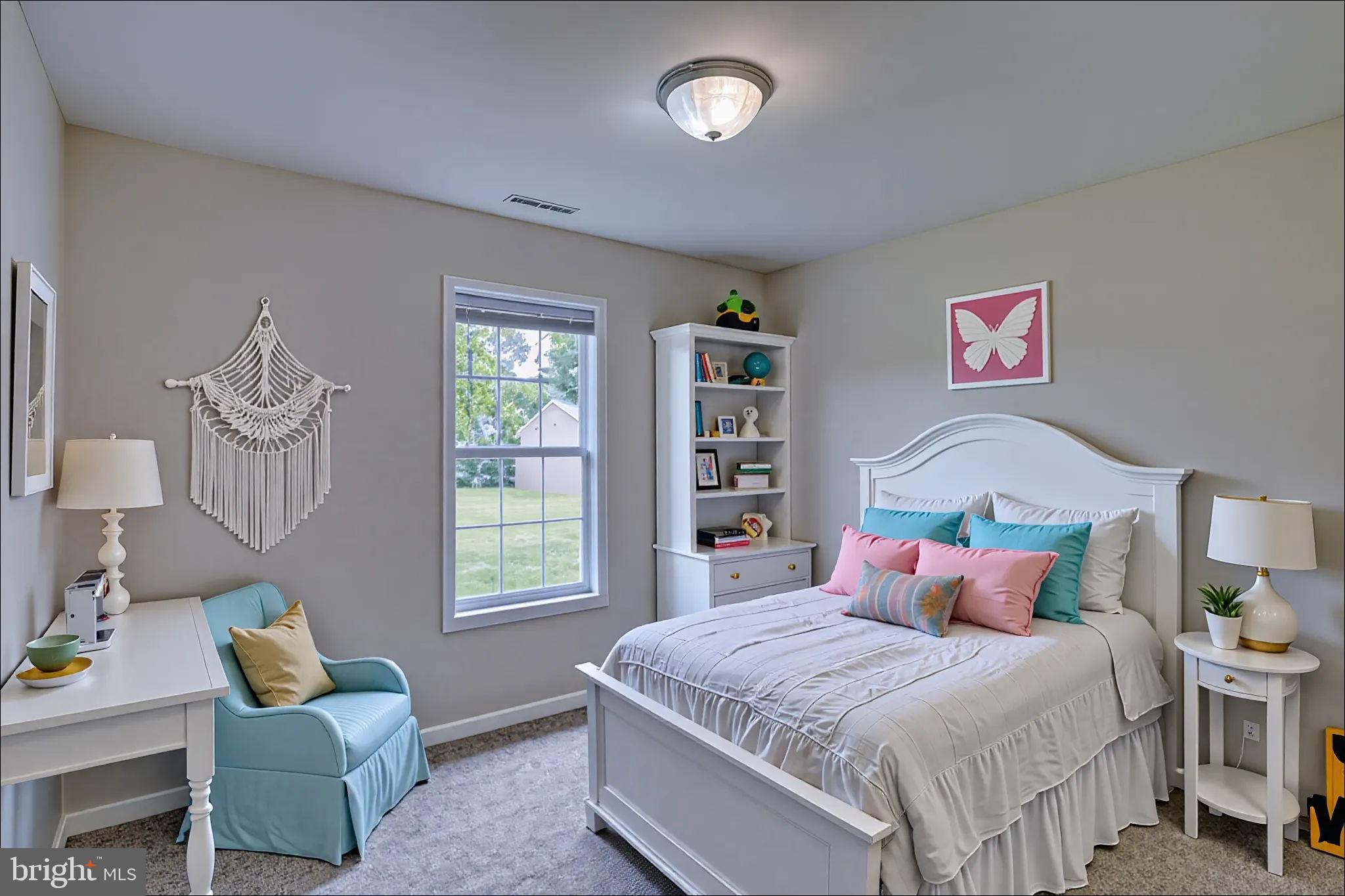 5926 Mt Holly Road East New Market, MD 21631 - Photo 28 of 36 a bedroom with a bed and a couch