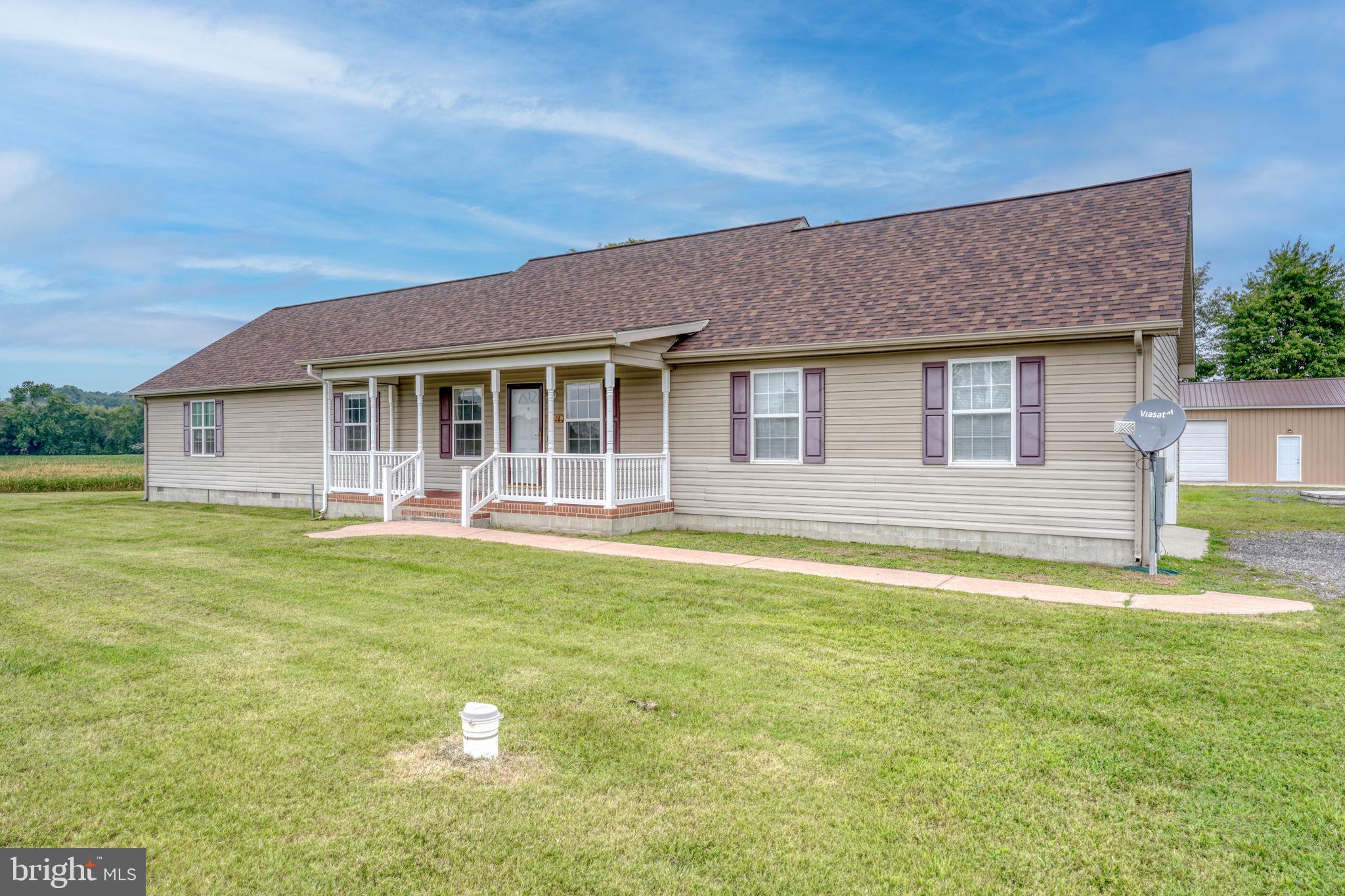 5926 Mt Holly Road East New Market, MD 21631 - Photo 4 of 36 a house view with swimming pool in front of it