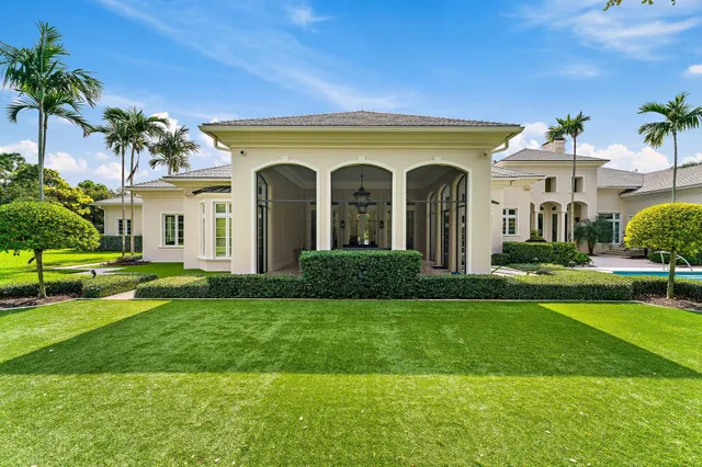 a view of a house with a swimming pool